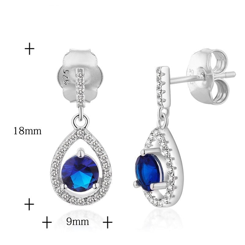 Wee Luxury Silver Earrings Silver Synthetic Sapphire Dangle Earrings Attract Light