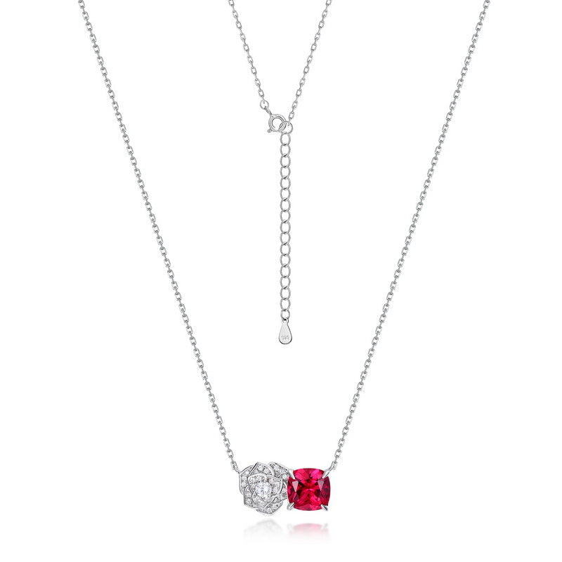 Luminous silver pendant necklace with floral design and red accent for women.