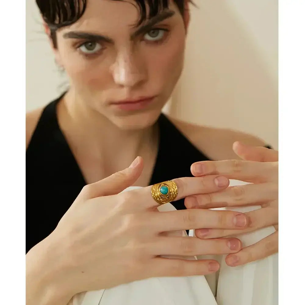 Trendy red blue natural stone stainless steel open ring worn by a model.